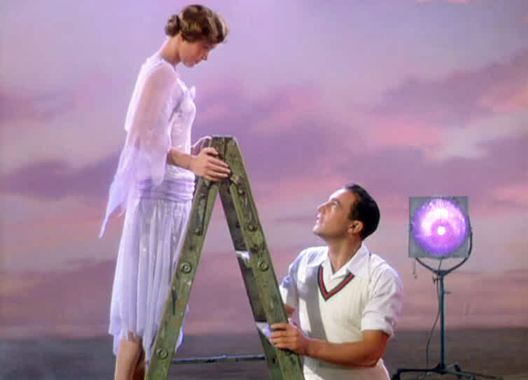 cantando-bajo-lluvia